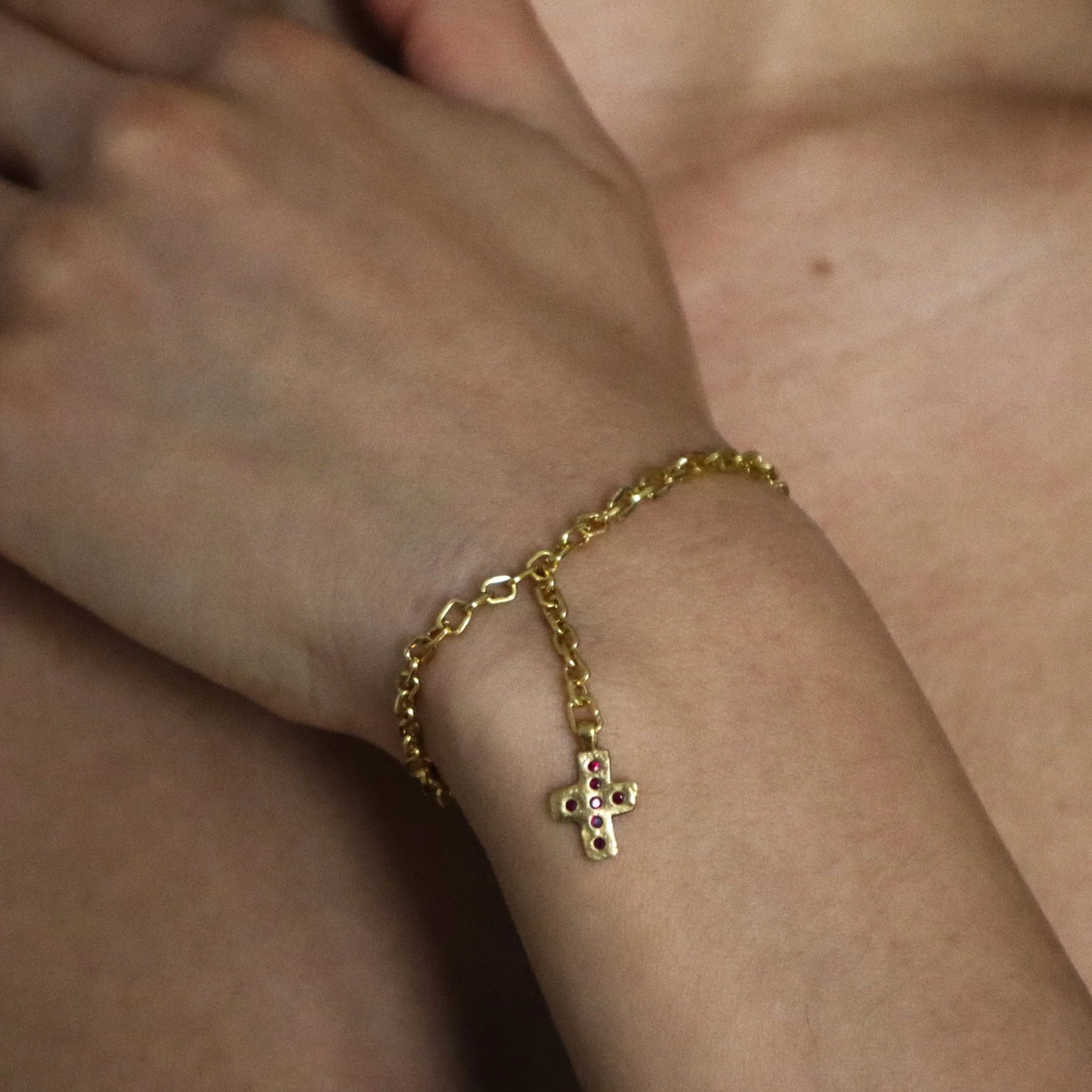 22k Gold and Ruby Water to Wine Cross Bracelet handcrafted in New York City by Nelly Creative Studios