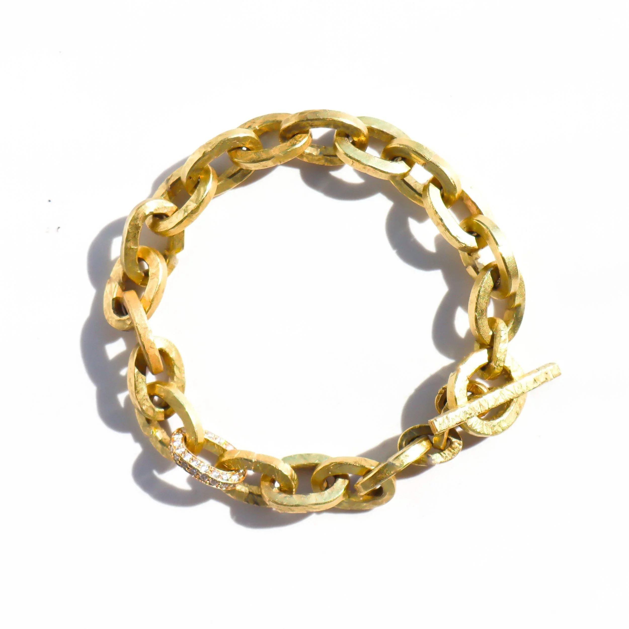 Small Gold Diamond Links Bracelet with hammered texture and pave diamond link in 18 karat gold by Nelly Creative Studios