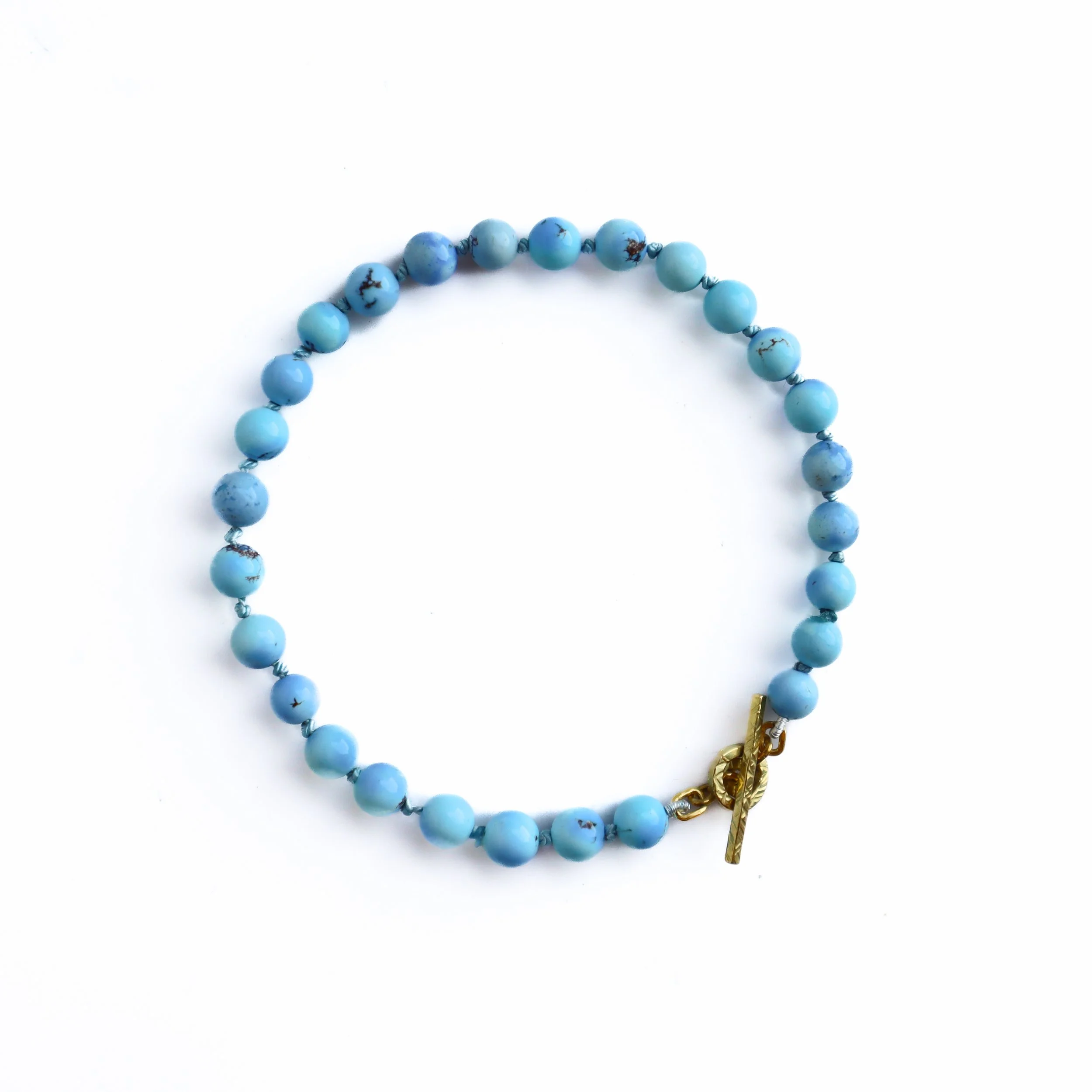 Small Kazakhstan Turquoise Bead Gold Toggle Bracelet by Nelly Creative Studios