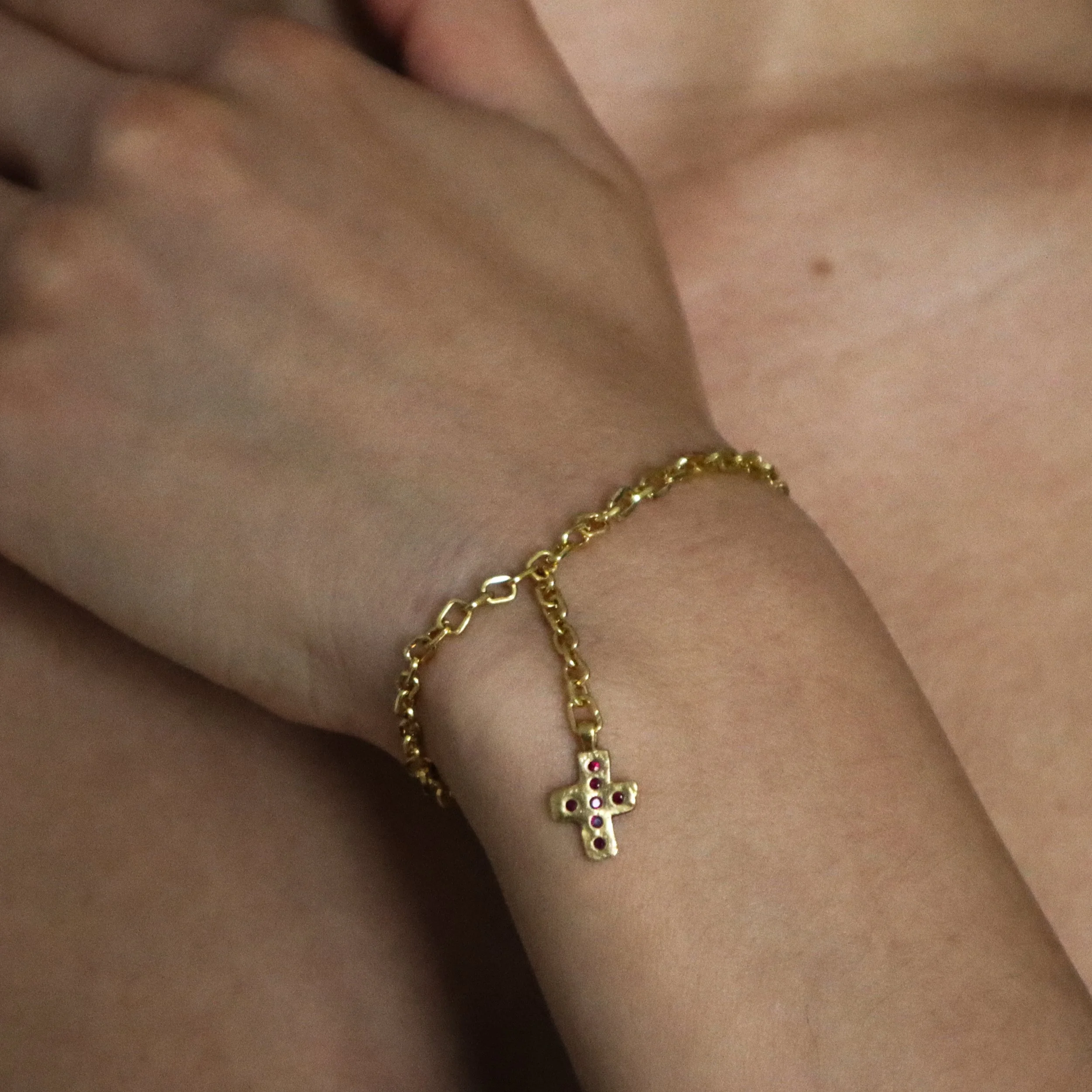 22k Gold and Ruby Water to Wine Cross Bracelet handcrafted in New York City by Nelly Creative Studios